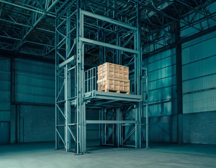 Free standing freight elevator structure in a warehouse, illustration only